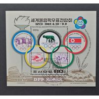 Корея/КНДР/1987/ Спорт / Филателия. ЭМБЛЕМА выставка почтовых марок. Олимп Филикс - 87 / Блок