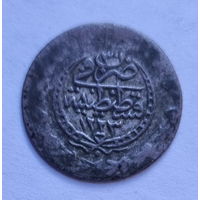Серебряная монета востока.