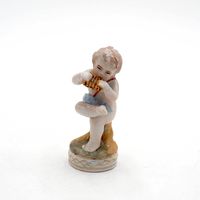 Статуэтка Малыш Путти с губной гармошкой. Германия. Арт. 678