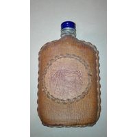 Бутылка в кожаном чехле