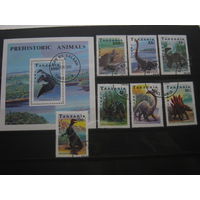 Марки - Фауна Танзания. #854-60+БЛ 146. Доисторические животные. Динозавры блок и 7 марок