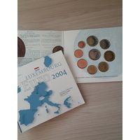 Люксембург 2004 год. 1, 2, 5, 10, 20, 50 евроцентов, 1, 2 евро и 2 евро юбилейные 2004 года . Набор монет в BU буклете.