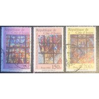 Кот д`Ивуар. 1994 год. Витражи базилики Девы Марии Мира. 3 марки.  Mi:CI 1120-1122. Почтовое гашение.
