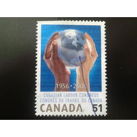 Канада 2006 руки держат Землю